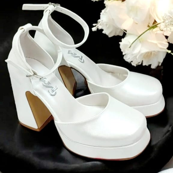 Pearl white platform wedding heels with ankle strap, perfect for brides and special occasions. Comfortable, stylish, and high-quality. Beirut Lebanon