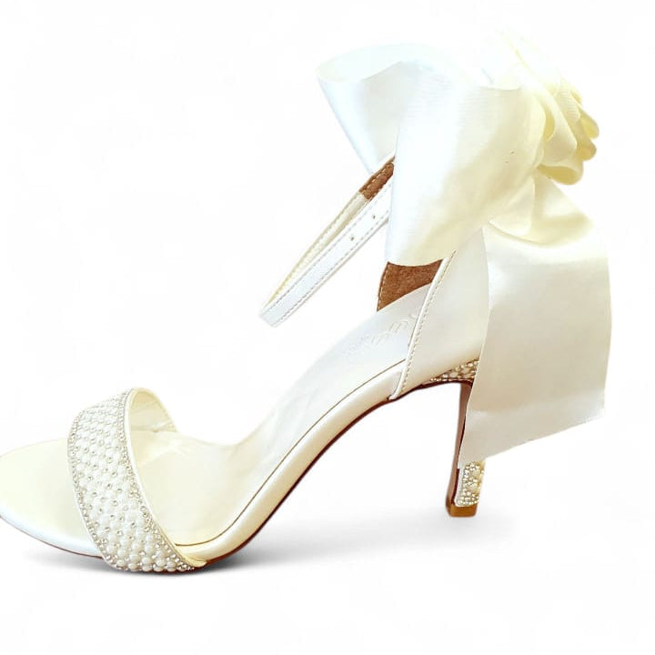 Pearl bow bridal wedding heels sandals in pearl white color for brides and bridesmaids in Beirut Lebanon from White Lily Brides – timeless satin bow design, perfect for weddings, engagements, graduations, and special occasions, available for delivery all over Lebanon.