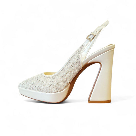 High-heeled shoe with glittery design on a white background