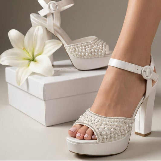 Comfortable matte Pearl white wedding shoes with a thick block High heel, platform sole, and supportive ankle strap for all-day comfort. 14cm