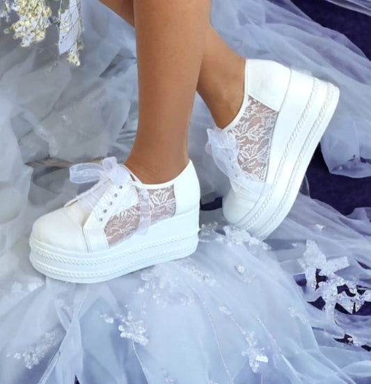 8 cm Elegant white bridal sneakers with an 8cm wedge heel, featuring delicate lace panels Perfect for brides seeking style and comfort on their wedding day in Beirut Lebanon