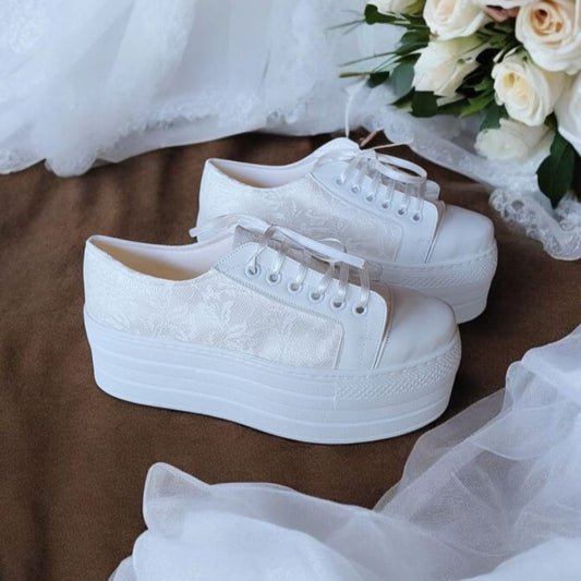 7 cm wedding white lace platform bridal sneakers by White Lily Brides—wedding, bridesmaid, graduation & baptism shoes for brides in Beirut, Lebanon. Online shop for bridal wedding shoes, heels, sandals, sneakers.