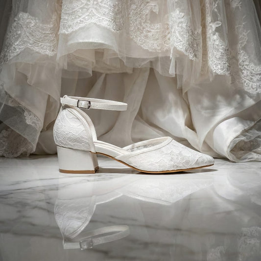 Comfortable low heel bridal shoes with breathable lace mesh and sturdy block heel for garden or beach weddings.