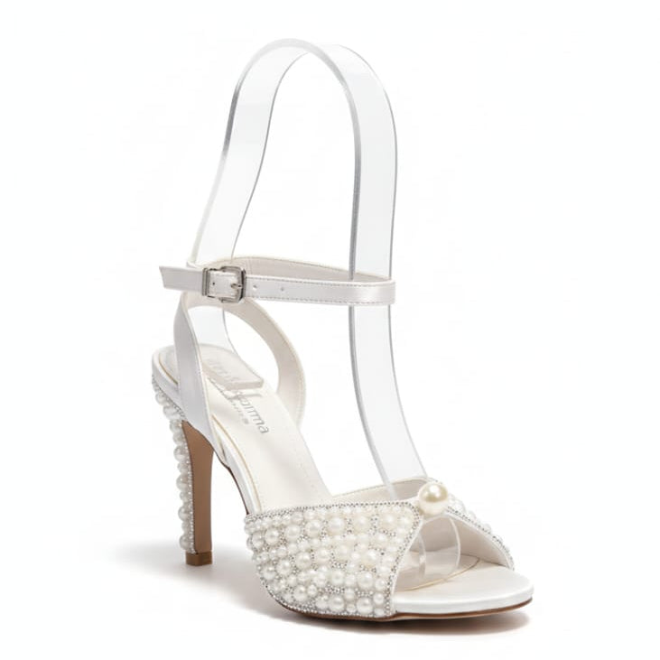Bridal pearl heels 10cm with ankle strap worn by bride on wedding day