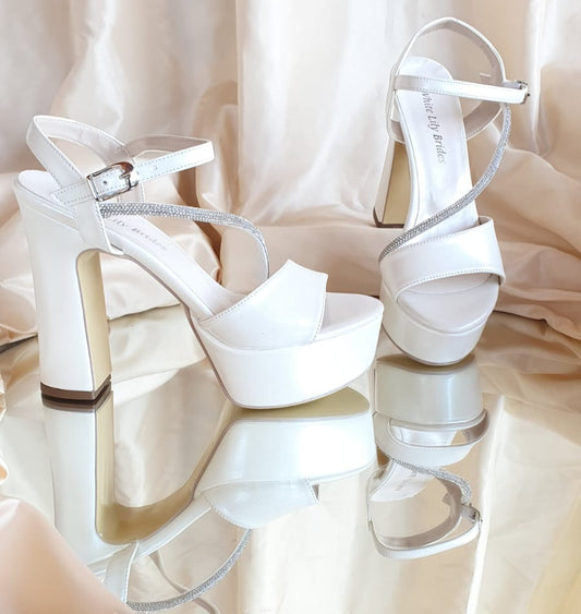 White Bridal Sandal Beirut
 Bridal heels Beirut

Wedding shoes Lebanon

White platform heels Beirut

High heel sandals bridal Lebanon

Rhinestone wedding sandals

Block heel bridal shoes

Bridesmaid heels Lebanon

Graduation shoes Lebanon