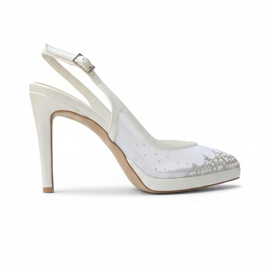 Pearl White high-heeled bridal shoe with decorative elements on a white background in Beirut Lebanon