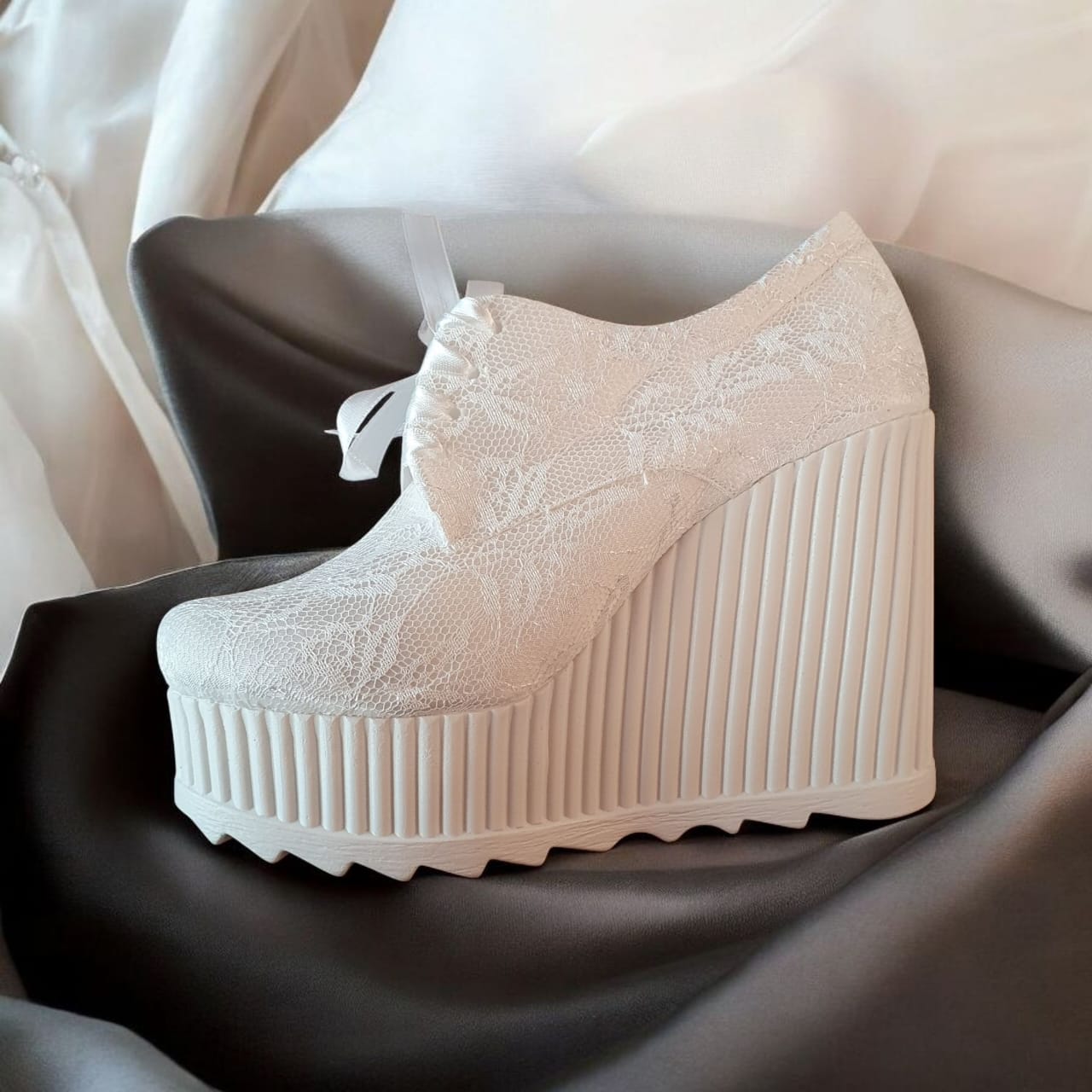 Pearl white bridal wedge platform shoe with lace and ribbon closure by White Lily Brides, ideal for brides and bridesmaids in Beirut Lebanon with Double Semelle comfort. Perfect for weddings, special occasions, graduation, and baptism. Online shop delivery.