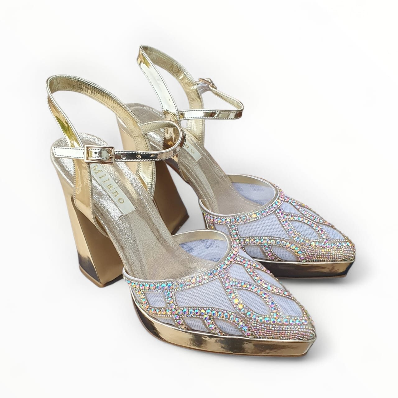 Gold high-heeled shoes with rhinestone embellishments on a white background