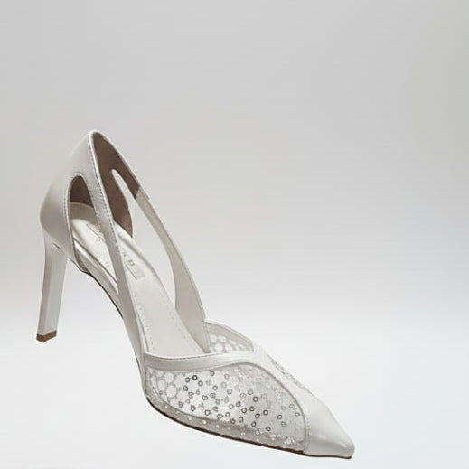 White high-heeled shoe with clear heel on a white background