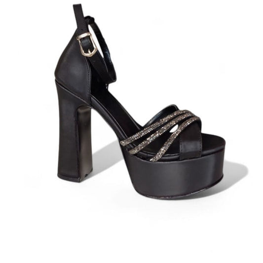 Black platform high heel shoe on a white background