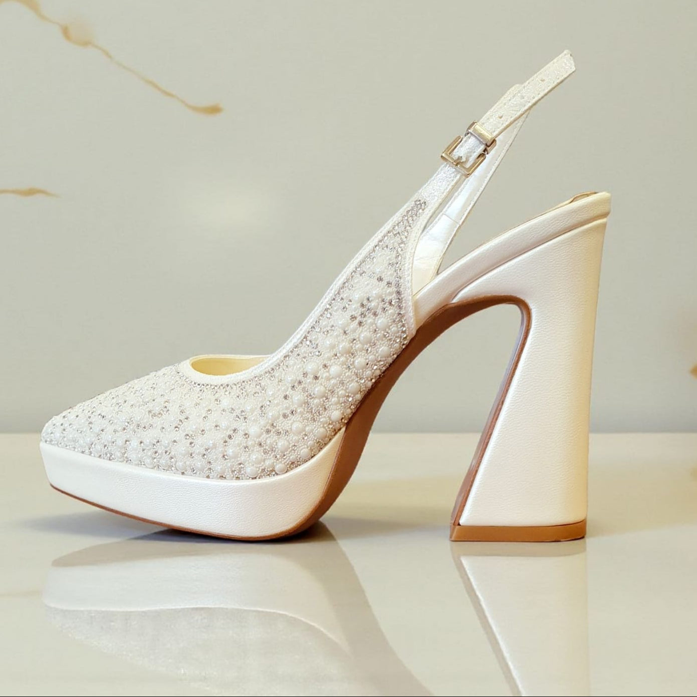Pearl-embroidered slingback platform block heel bridal shoe by White Lily Brides, perfect for brides and bridesmaids in Beirut Lebanon. Elegant modern wedding design with delivery.