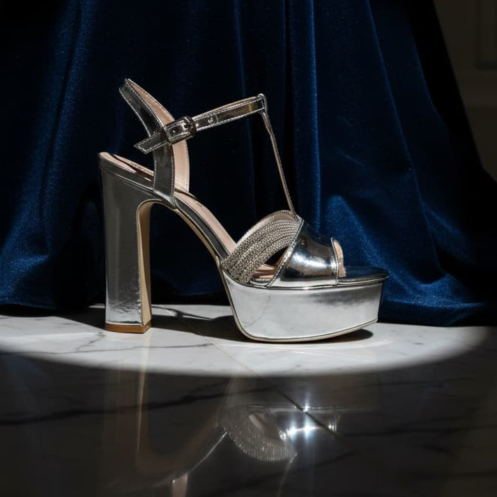 Silver high-heeled shoes