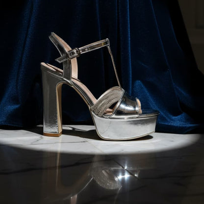 Silver high-heeled shoes