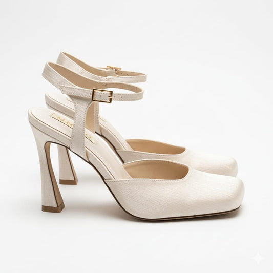 Elegant champagne bridal shoes by White Lily Brides featuring an 11cm architectural heel and ankle strap, Beirut.