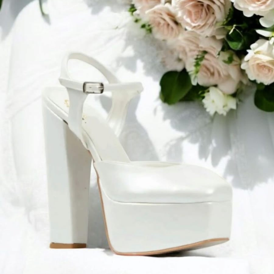 bridal heels in Lebanon  Beirut15-16 cm heel, double Semele, and secure ankle strap, these pearl white heels offer comfort and elegance. shop now!
