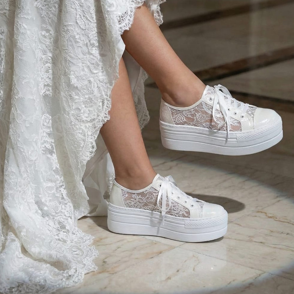 Modern bridal footwear featuring white lace overlays and thick platform soles, luxury wedding fashion accessories available in Beirut, Lebanon.
