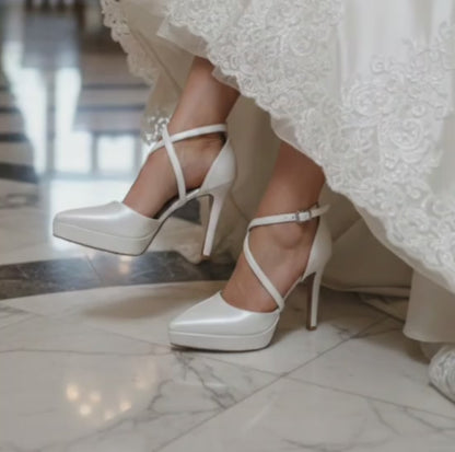 Bride wearing a white wedding dress and wedding shoes in Beirut Lobby