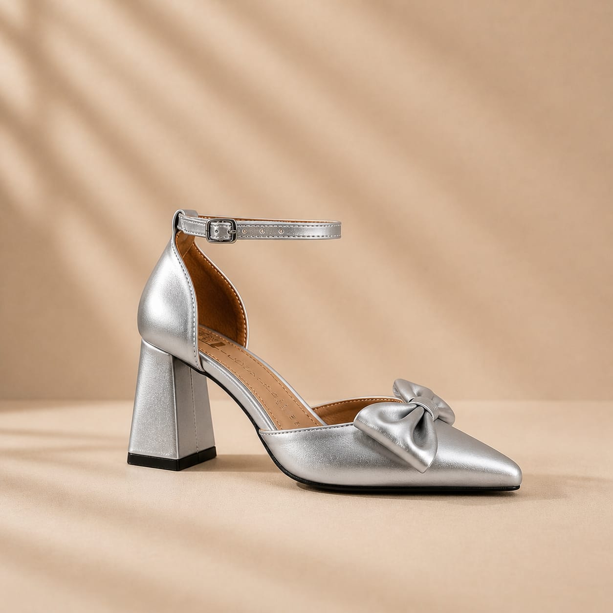 Silver bow block heel bridal shoes for graduations bridesmaids in Beirut Lebanon, featuring pointed toe, ankle strap, and elegant wedding shoe design.