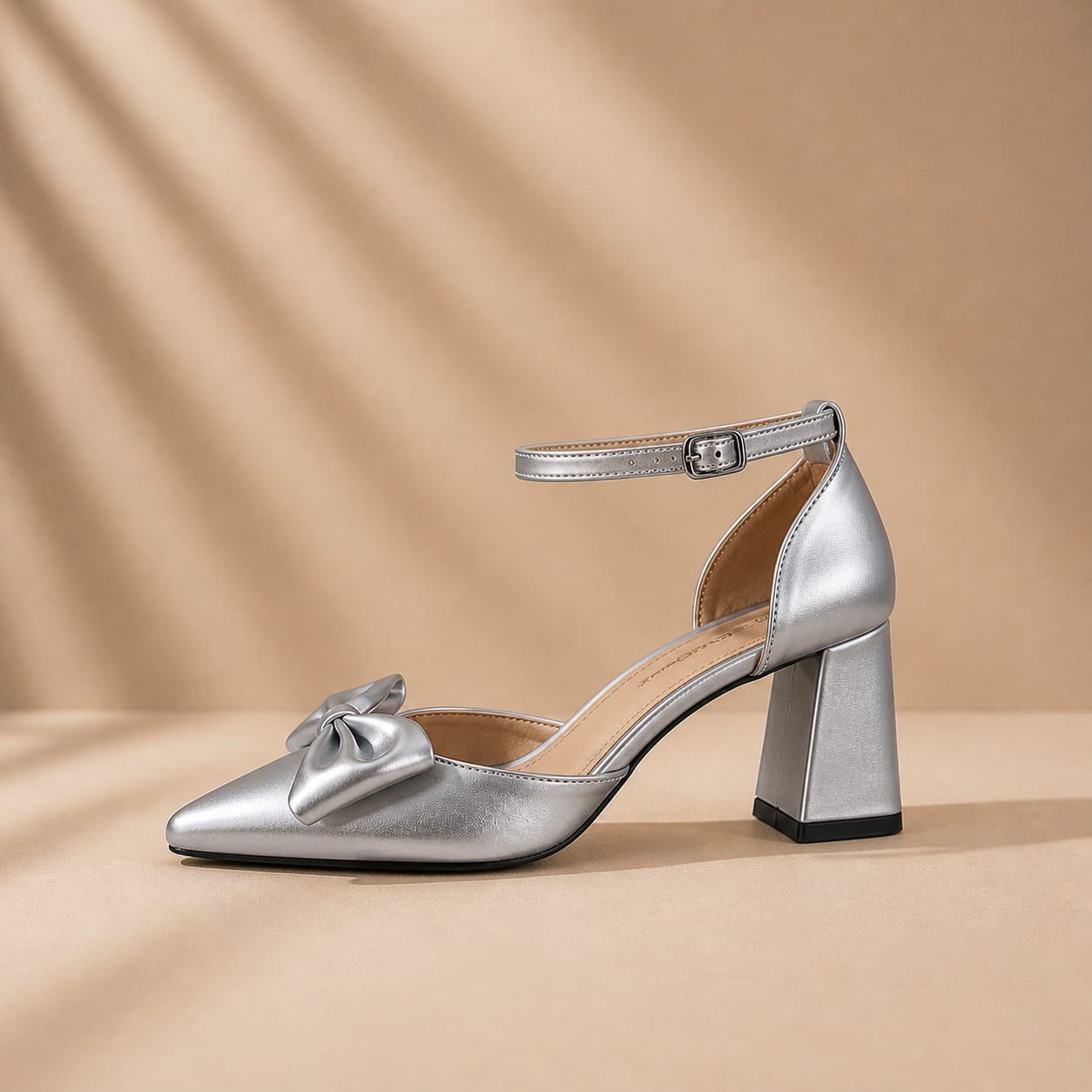 Elegant silver bridesmaid shoes in Beirut Lebanon with bow detail, pointed toe, ankle strap, and comfortable block heel for weddings.