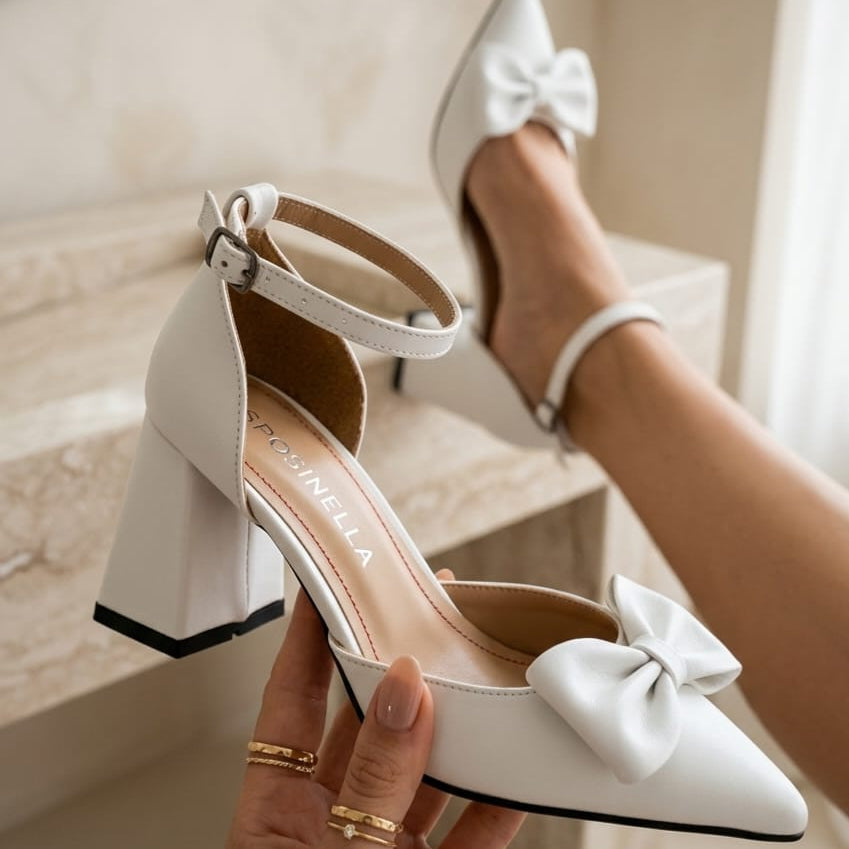 Luxury white leather bridal shoes with ankle strap and bow by White Lily Brides, located in Beirut, Lebanon