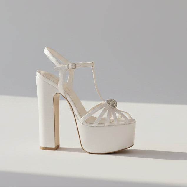 Professional studio shot of a White Lily Brides pearl white wedding white platform Sandal high heeled  shoe, 16cm high heel with 6cm platform and crystal detail, stocked in Beirut, Lebanon.